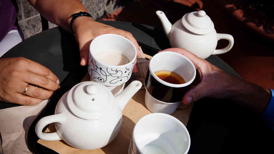 Palca and Morning Edition Executive Producer Madhulika Sikka test if hot tea can cool you down on a hot day. Palca and Morning Edition Executive Producer Madhulika Sikka test if hot tea can cool you down on a hot day.