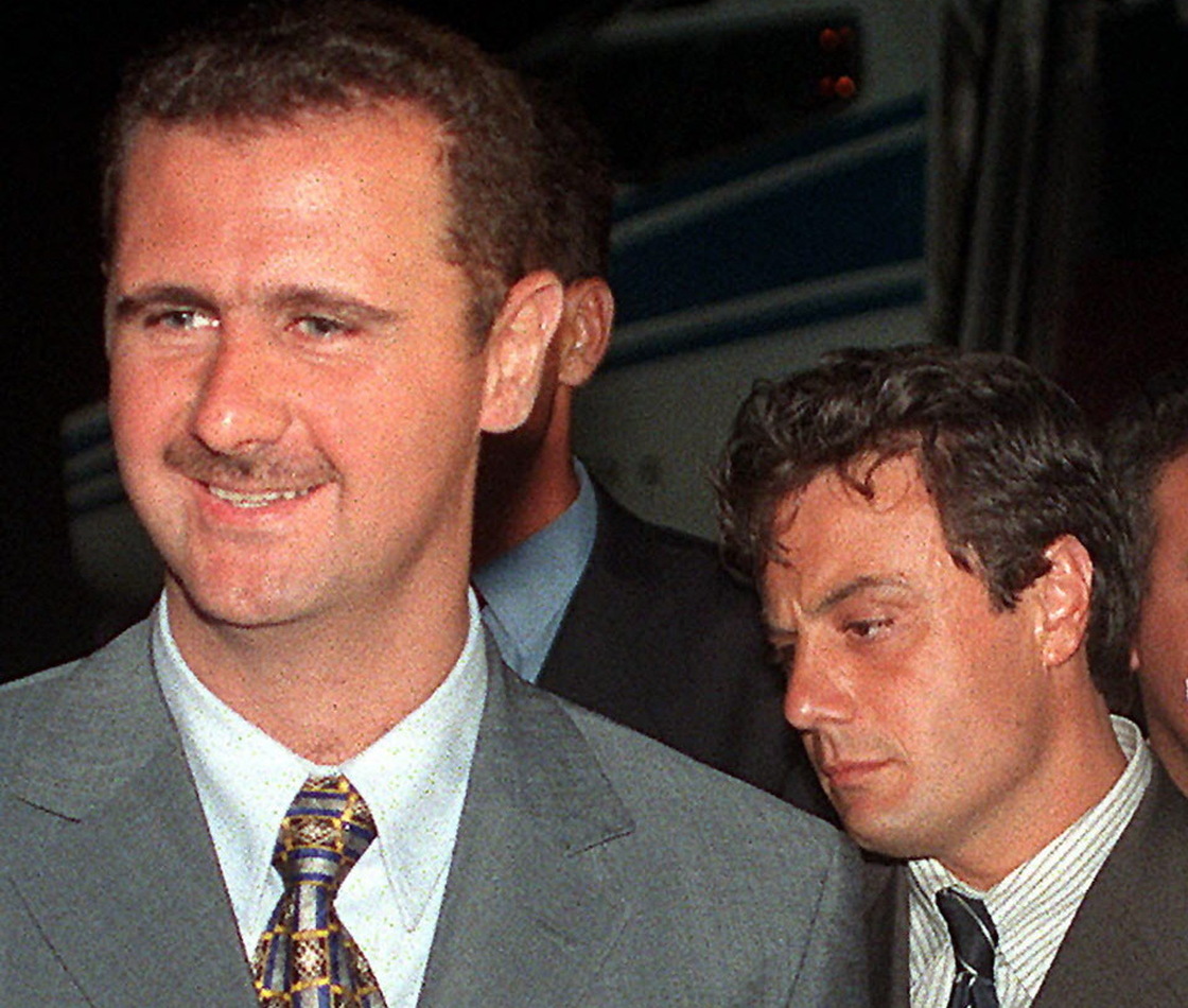 Then-Col. Bashar Assad (left) and Manaf Tlass in 1999. Tlass, now a brigadier general, has reportedly defected and is headed to France.