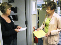 Deborah Klein (right) meets with Tricia Brister, volunteer coordinator at Griffin Hospital in Derby, Conn., about volunteer opportunities.