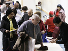 John Pham (right) reviews Bob Drake's resume at an AARP event aimed at helping older workers improve their job search. Workers age 55 and older cite particular difficulty finding employment, and some are choosing to retrain for new careers. John Pham (right) reviews Bob Drake's resume at an AARP event aimed at helping older workers improve their job search. Workers age 55 and older cite particular difficulty finding employment, and some are choosing to retrain for new careers.