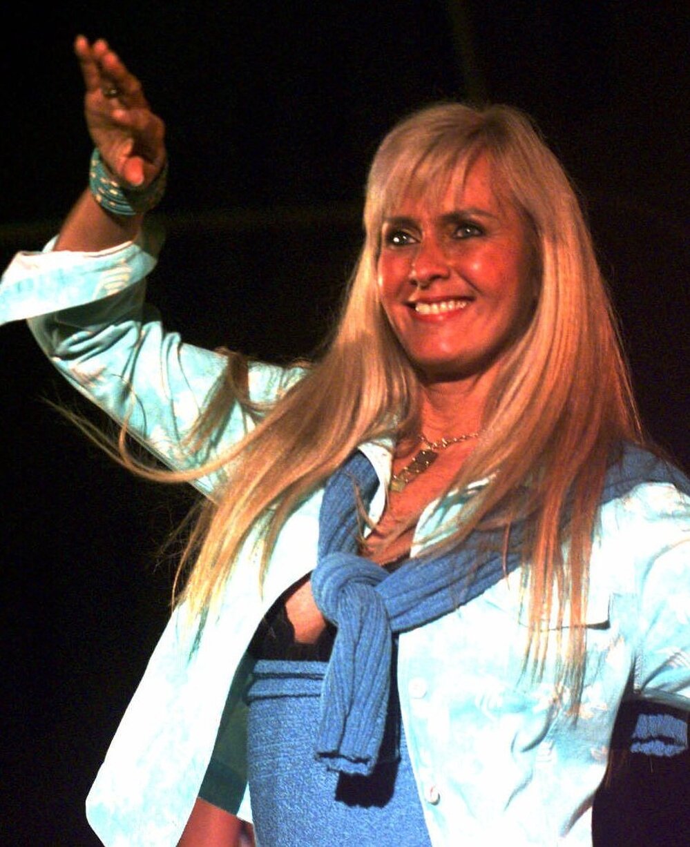 Helo Pinheiro, who inspired the song "The Girl From Ipanema," dances during a fashion show in Rio de Janeiro in 1999.