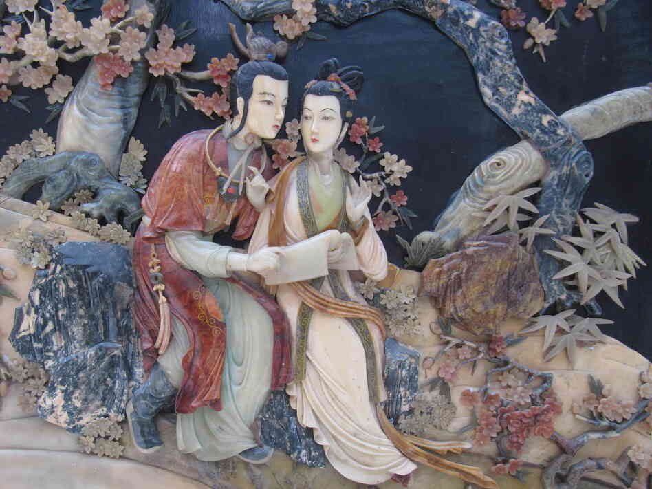 The romance between star-crossed lovers Jia Baoyu (left) and Lin Daiyu, depicted here in a relief panel, meets a tragic end in the classic Chinese novel Dream of the Red Chamber.