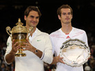 Roger Federer of Switzerland (left) and Andy Murray of Great Britain hold up their trophies after the men's singles final match at Wimbledon Sunday. Roger Federer of Switzerland (left) and Andy Murray of Great Britain hold up their trophies after the men's singles final match at Wimbledon Sunday.