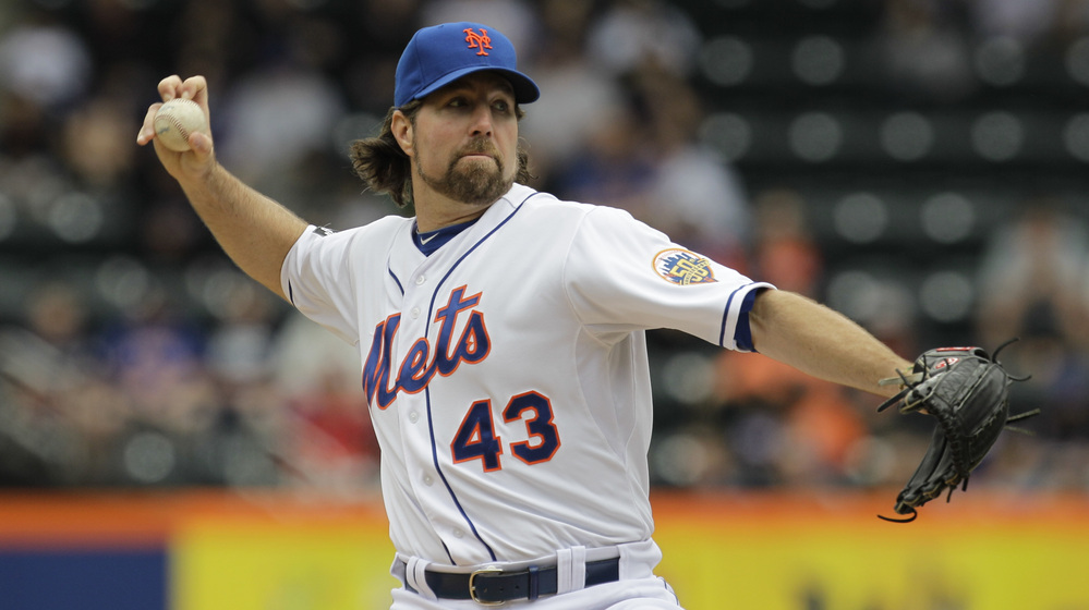 New York Mets pitcher R.A. Dickey delivers his signature pitch, with its unusual grip, against the Arizona Diamondbacks on May 6. He's the only knuckleballer in the major leagues, and the pitch has earned him a 12-1 record so far this season.