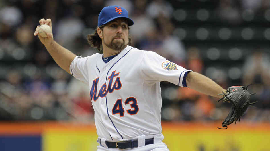 New York Mets pitcher R.A. Dickey delivers his signature pitch, with its unusual grip, against the Arizona Diamondbacks on May 6. He's the only knuckleballer in the major leagues, and the pitch has earned him a 12-1 record so far this season.