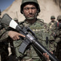 Afghan army soldiers, like the one pictured here, will be responsible for protecting Kabul and holding critical cities and roads together after the planned 2014 American troop withdrawal.