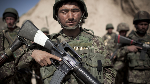 Afghan army soldiers, like the one pictured here, will be responsible for protecting Kabul and holding critical cities and roads together after the planned 2014 American troop withdrawal.
