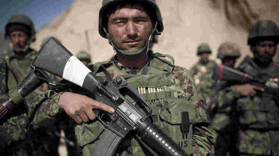 Afghan army soldiers, like the one pictured here, will be responsible for protecting Kabul and holding critical cities and roads together after the planned 2014 American troop withdrawal.
