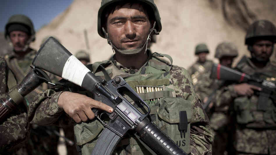 Afghan army soldiers, like the one pictured here, will be responsible for protecting Kabul and holding critical cities and roads together after the planned 2014 American troop withdrawal.