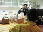 A boy waits to get his anti-AIDS drugs from pharmacist Rajesh Chandra at the Botswana-Baylor Children's Clinical Center of Excellence in Gaborone. A boy waits to get his anti-AIDS drugs from pharmacist Rajesh Chandra at the Botswana-Baylor Children's Clinical Center of Excellence in Gaborone.