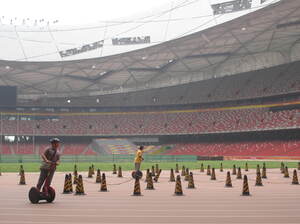 One money-making scheme has been to lease out Segways to tourists: $20 for a 15-minute ride around the Olympic track at the Bird's Nest. One money-making scheme has been to lease out Segways to tourists: $20 for a 15-minute ride around the Olympic track at the Bird's Nest.