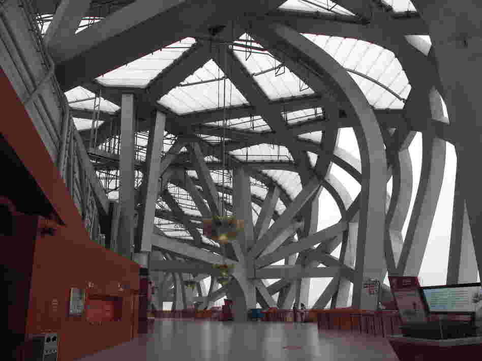The Bird's Nest, with its cavernous arches, has fewer and fewer visitors these days. Few events can fill a stadium built to seat 91,000.