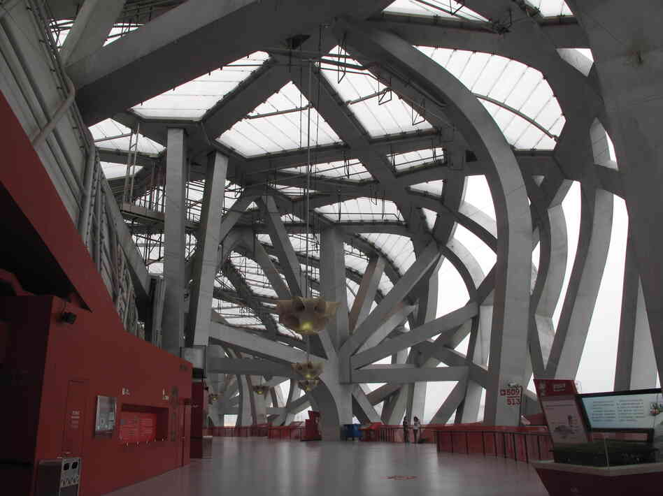 The Bird's Nest, with its cavernous arches, has fewer and fewer visitors these days. Few events can fill a stadium built to seat 91,000.