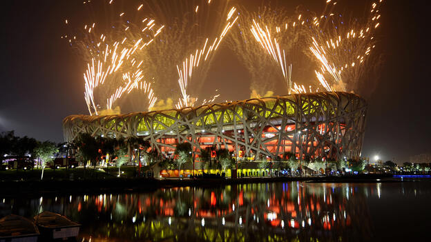 Fireworks light the night sky above the National Stadium, known as the Bird's Nest, during the closing ceremony of the 2008 Beijing Olympic Games. The stadium is largely empty these days. Fireworks light the night sky above the National Stadium, known as the Bird's Nest, during the closing ceremony of the 2008 Beijing Olympic Games. The stadium is largely empty these days.