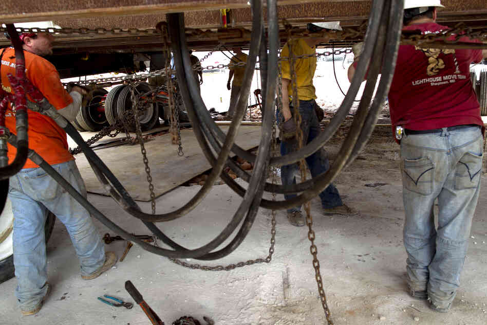 It takes considerable time and manpower to move the buildings, which weigh at least 60 tons.