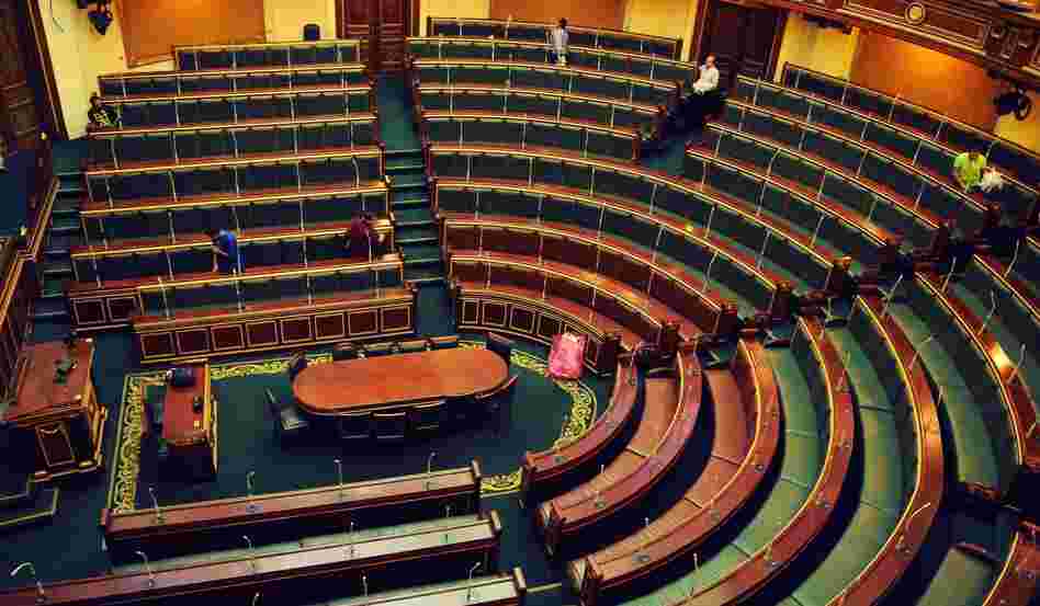 Workers clean inside the Egyptian parliament in Cairo on Monday.