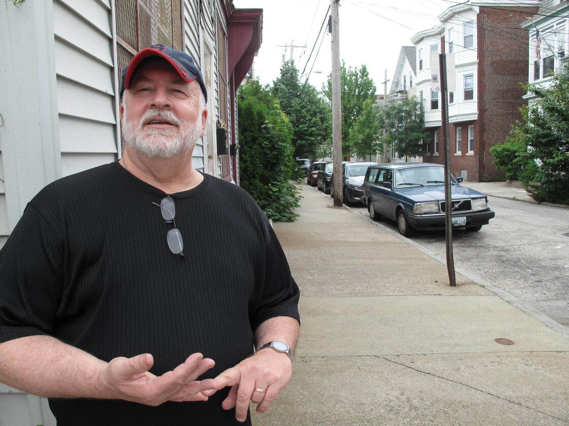 Author Bruce DeSilva shows NPR's Jennifer Ludden around Providence's America Street, where he imagines his main character, Liam Mulligan, lives "in an apartment furnished with a Salvation Army mattress, an ancient Frigidaire and not much else."