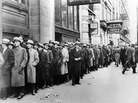 Thousands of unemployed people wait outside the State Labor Bureau in New York City to register for federal relief jobs in 1933. Thousands of unemployed people wait outside the State Labor Bureau in New York City to register for federal relief jobs in 1933.