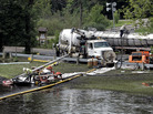 Workers in Battle Creek, Mich., use suction hoses to try to clean up an 800,000-gallon oil spill in the Kalamazoo River in July 2010. Workers in Battle Creek, Mich., use suction hoses to try to clean up an 800,000-gallon oil spill in the Kalamazoo River in July 2010.