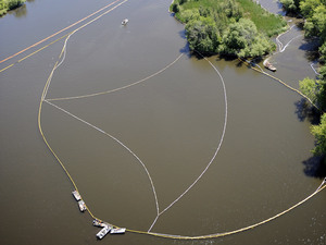 Cleanup work continues on the Kalamzoo River almost a year after the oil spill.