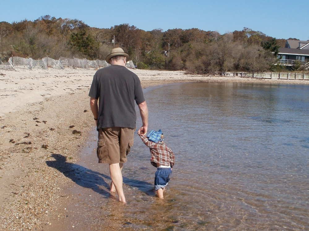 Loudon Wainwright III at the beach with his grandson Archangelo, the son of Martha Wainwright.