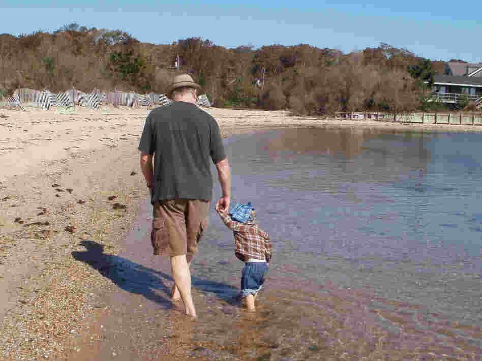 Loudon Wainwright III at the beach with his grandson Archangelo, the son of Martha Wainwright.