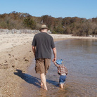 Loudon Wainwright III at the beach with his grandson Archangelo, the son of Martha Wainwright.
