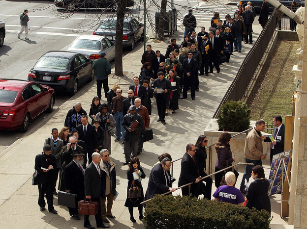Job seekers wait to attend a job fair in the Brooklyn borough of New York City in 2010.