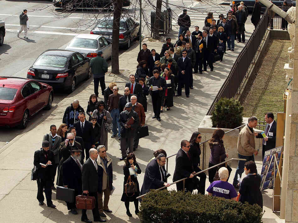 Job seekers wait to attend a job fair in the Brooklyn borough of New York City in 2010.