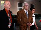 Former Penn State assistant football coach Jerry Sandusky leaves the Centre County Courthouse in handcuffs after a jury found him guilty on 45 of 48 charges in his sex abuse trial in Bellefonte, Pa., Friday. Former Penn State assistant football coach Jerry Sandusky leaves the Centre County Courthouse in handcuffs after a jury found him guilty on 45 of 48 charges in his sex abuse trial in Bellefonte, Pa., Friday.