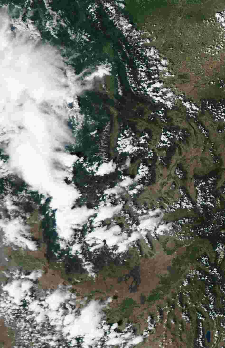 The view from above: A satellite image of Idaho and western Montana, taken Monday and posted by the USDA Forest Services's Active Fire Mapping website, showing smoke and clouds.