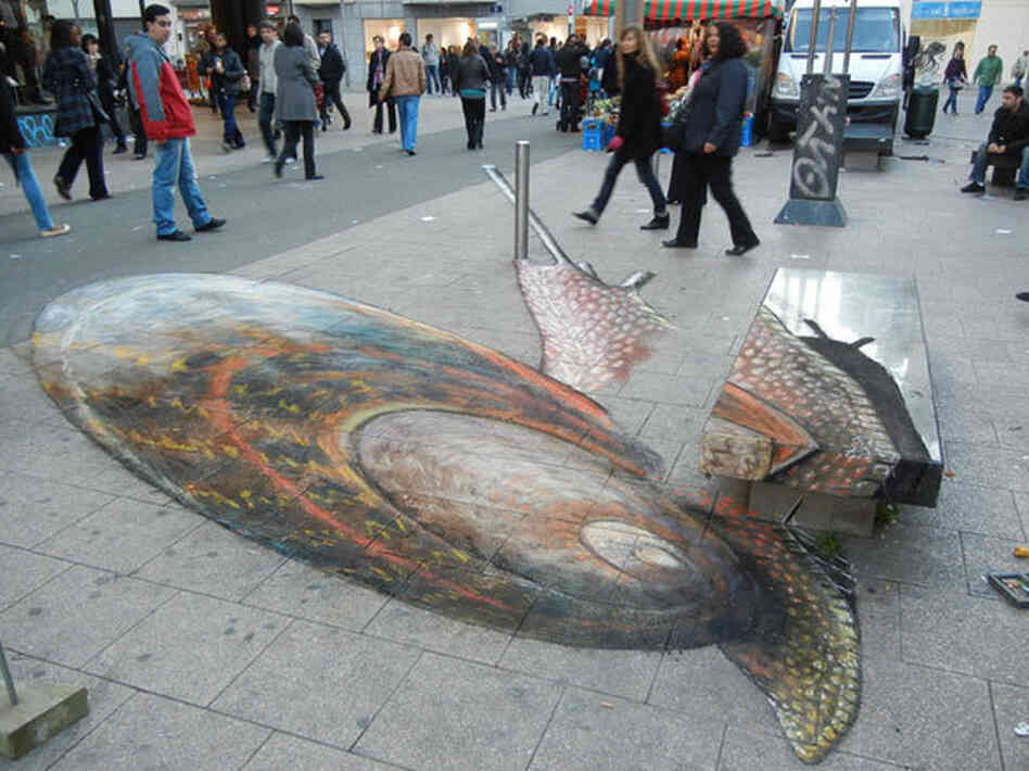 Snail pavement drawing viewed from the wrong perspective.