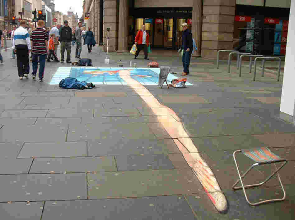 A pavement drawing of a woman in a pool viewed from the wrong angle.