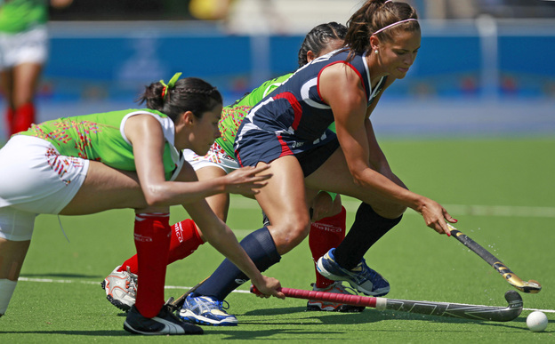 Paige Selenski (right) of the United States fights for the ball against two Mexican opponents in a women's field hockey match at last October's Pan American Games in Mexico. Paige Selenski (right) of the United States fights for the ball against two Mexican opponents in a women's field hockey match at last October's Pan American Games in Mexico.