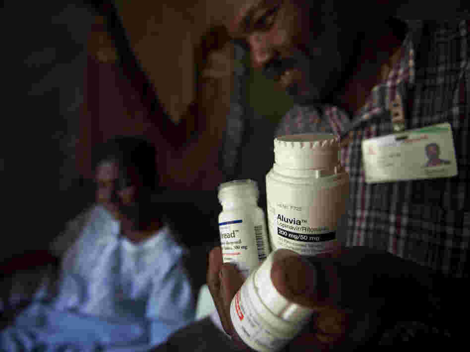 Generic antiretroviral drugs have made treatment widely available for people like Marie Lourdes Pierre (left), a patient with HIV/AIDS in Haiti.