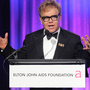 Sir Elton John speaks at an Elton John AIDS Foundation benefit in 2010. The organization, which John founded in 1992, provides grants to support HIV and AIDS prevention and treatment programs.
