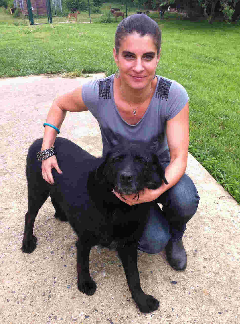 Claire Brissard runs an SPCA shelter outside Paris. She says too many French equate a pet with a stuffed animal — to be thrown away when they get tired of it. Claire Brissard runs an SPCA shelter outside Paris. She says too many French equate a pet with a stuffed animal — to be thrown away when they get tired of it.