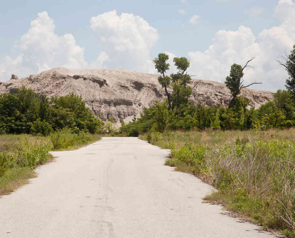 Chat Pile, Picher, 2010. Chat piles are the remnants of mining. Mountains of gravel with traces of lead, the piles are not only the source of many activities for local residents (they are fun to climb and ride ATVs and bikes on), but they are also incredibly valuable.