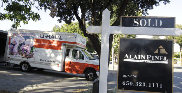 A moving truck is shown at a house that was sold in Palo Alto, Calif. on Tuesday.