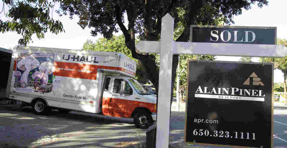A moving truck is shown at a house that was sold in Palo Alto, Calif. on Tuesday.