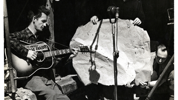 Woody Guthrie singing, Smithsonian Folkways image Woody Guthrie singing, Smithsonian Folkways image