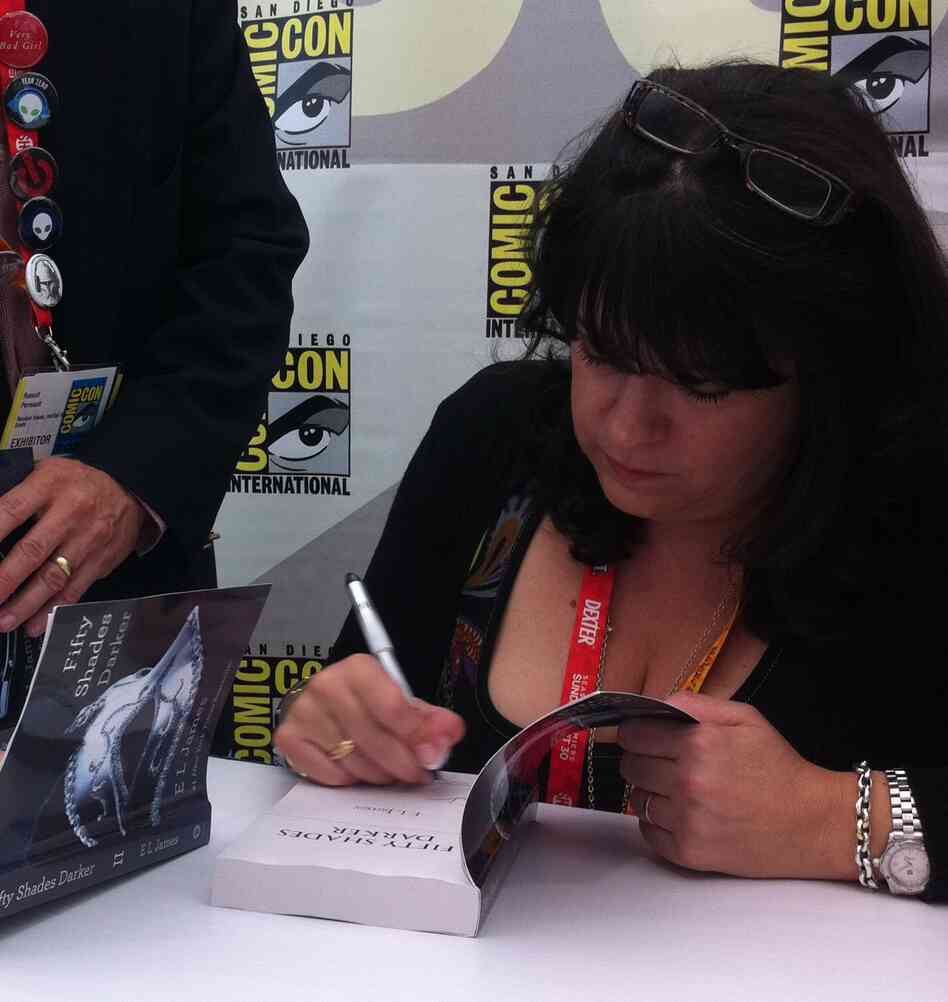 E.L. James signs copies of her book Fifty Shades of Grey at Comic-Con in San Diego on Thursday.
