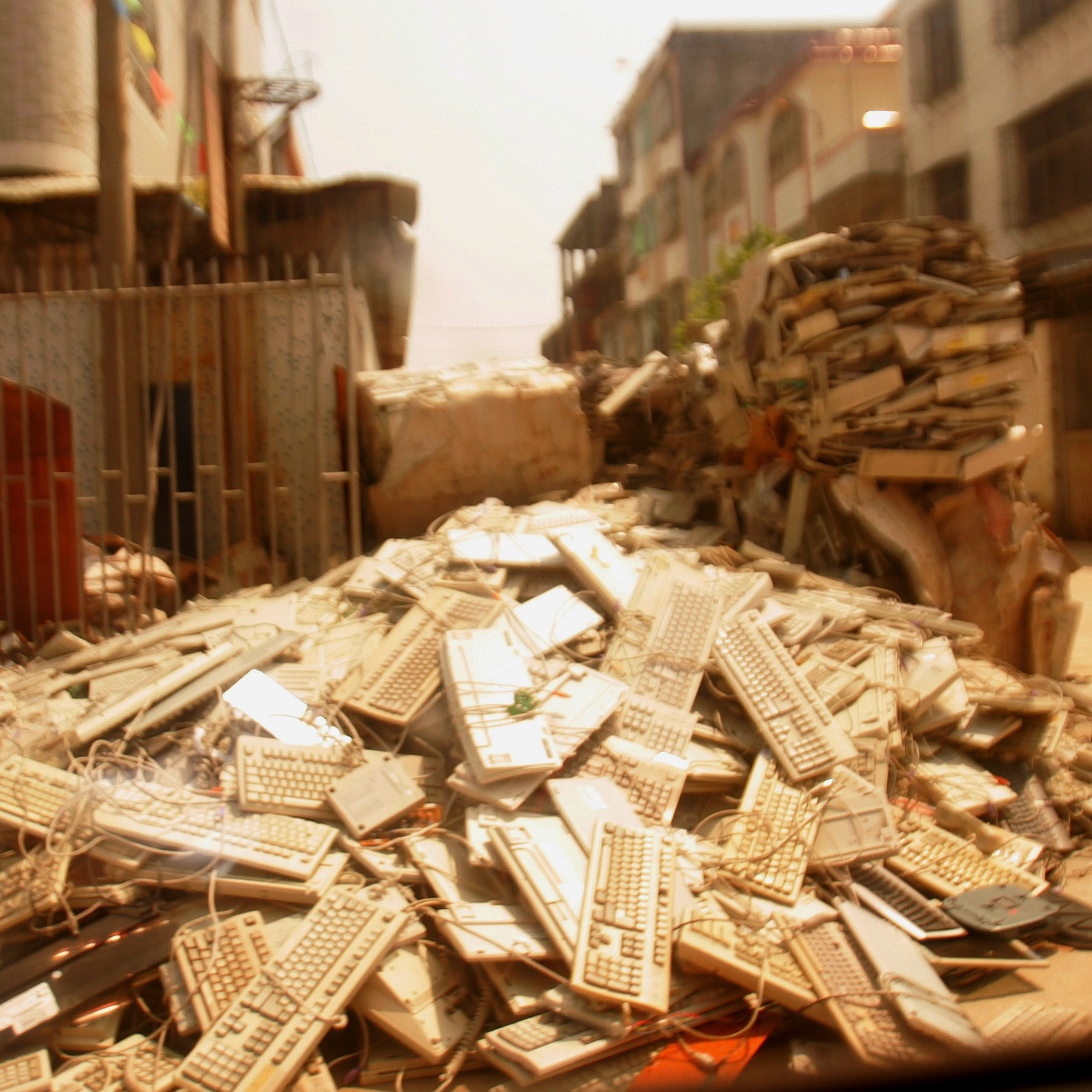 Guiyu, China, is known for its electronics recycling workshops, but Blackwell says the town has a strangely rural, even agricultural, feel. "There are giant piles of keyboards, which reminded me a lot of bales of cotton," he says.
