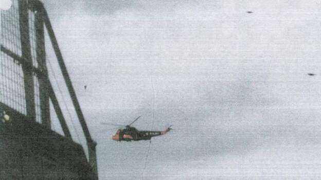 This picture titled "UFO near helicopter" was released by the National Archives.