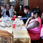 Support group members Pamela Travis (from left), Dominique Martin, Yovanda Dixon, Shanna Chaney and Ramona Shewl hold a meeting as part of the Family Independence Initiative. The Oakland nonprofit encourages low-income families to form small groups to help each other get ahead.