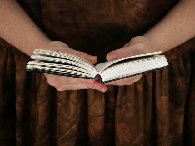 A woman reads.