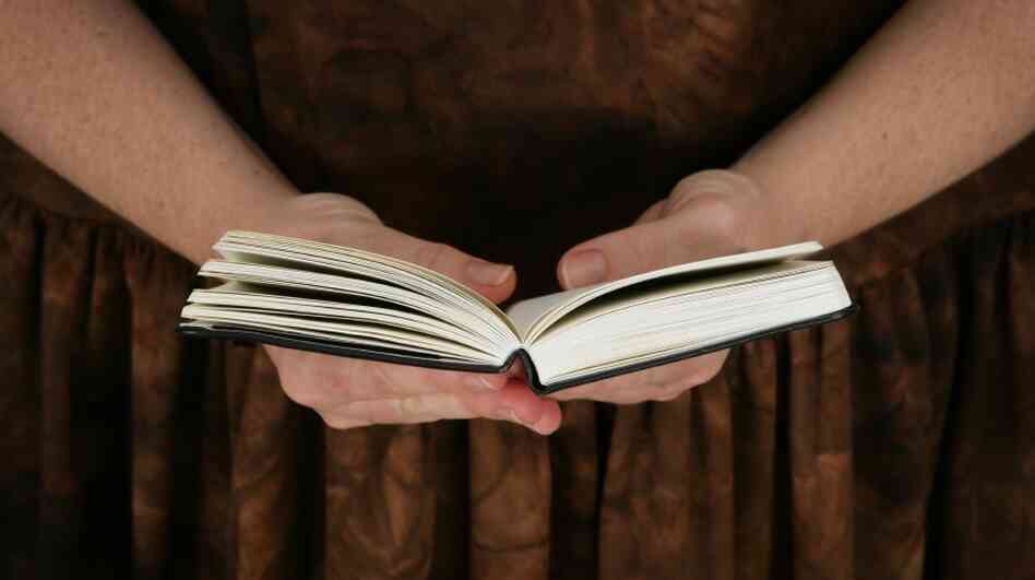 A woman reads.