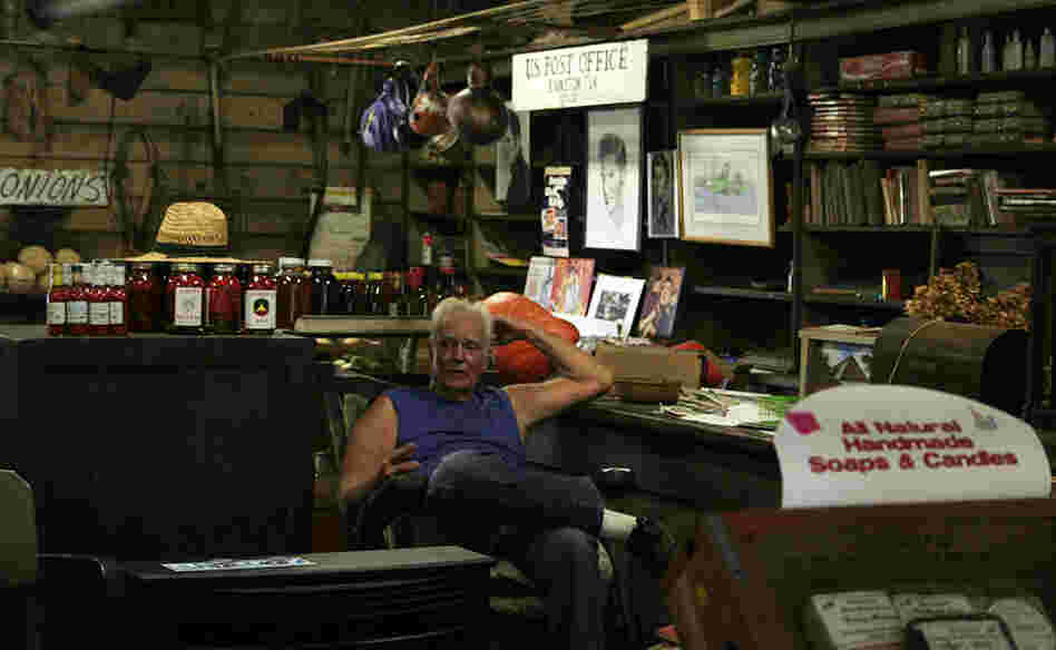 "The post office and the store, I just love it," Wood says. He spends most of his afternoons sitting in a rocking chair in the middle of the store.