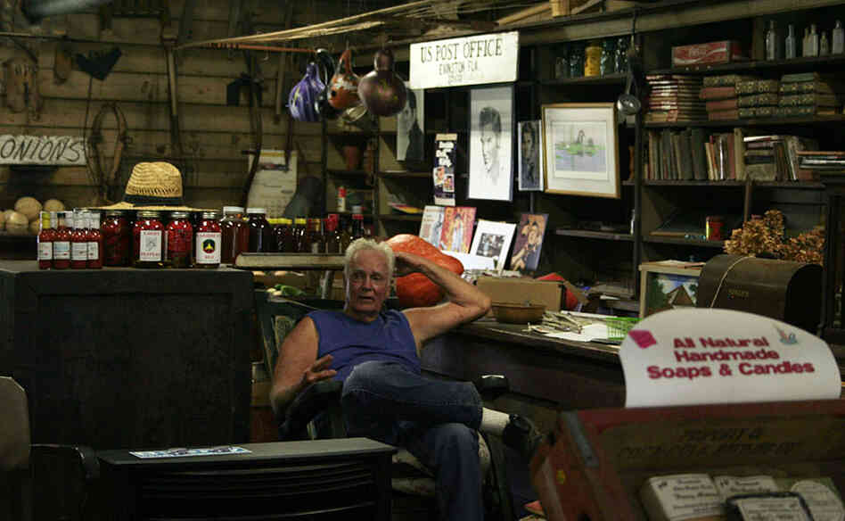 "The post office and the store, I just love it," Wood says. He spends most of his afternoons sitting in a rocking chair in the middle of the store.
