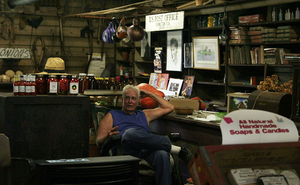 "The post office and the store, I just love it," Wood says. He spends most of his afternoons sitting in a rocking chair in the middle of the store.